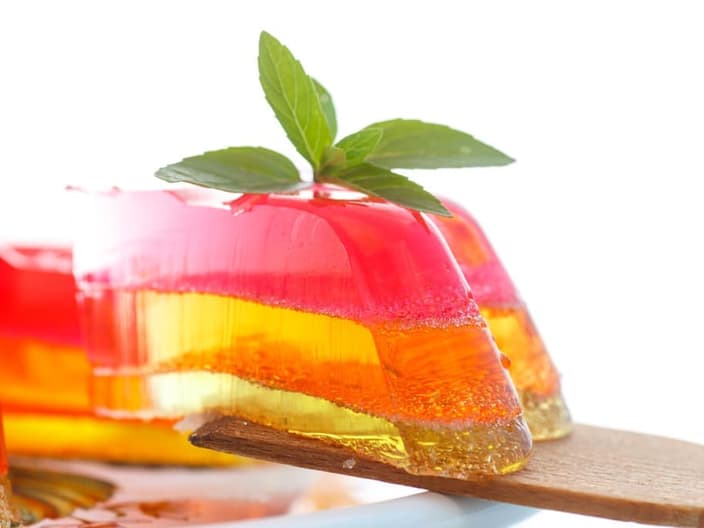 multi-layered fruit jelly isolated on white background