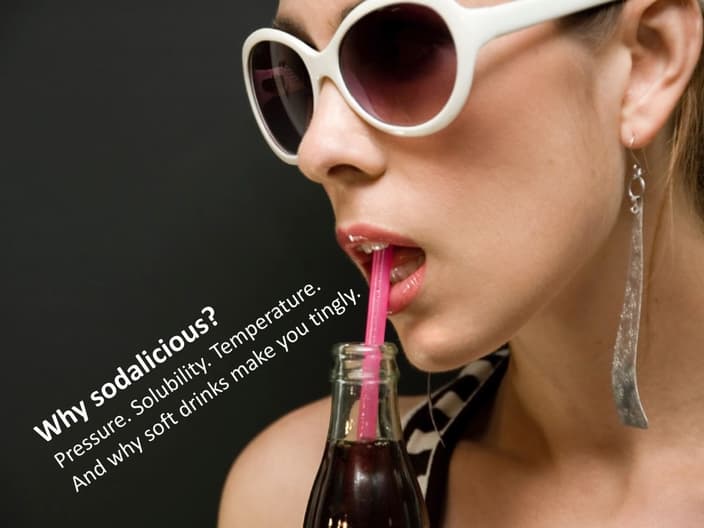 Woman Drinking Ice Cold Soda and Feeling Tingly