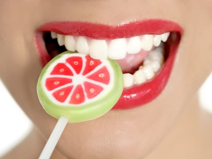 fluorine ion i.e. fluoride is added to water and toothpaste to protect our teeth