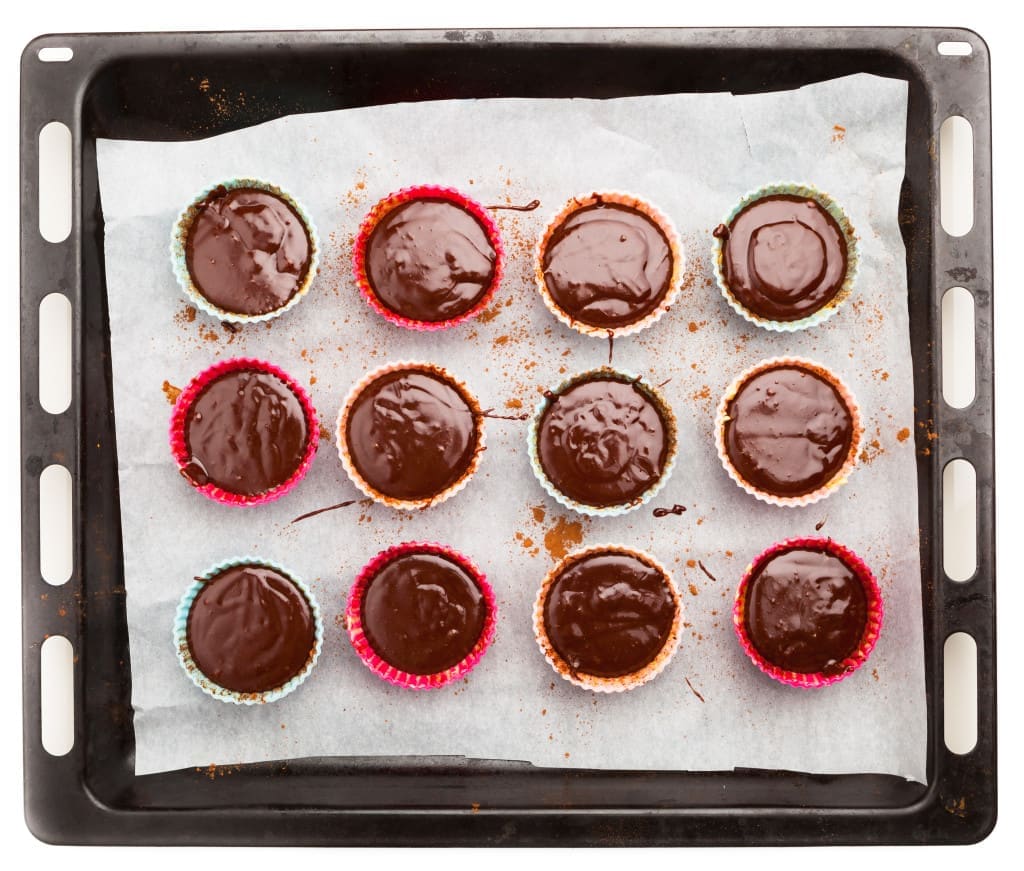 molten chocolate cakes on a baking tray