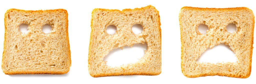 Toasted bread slices for breakfast with funny faces