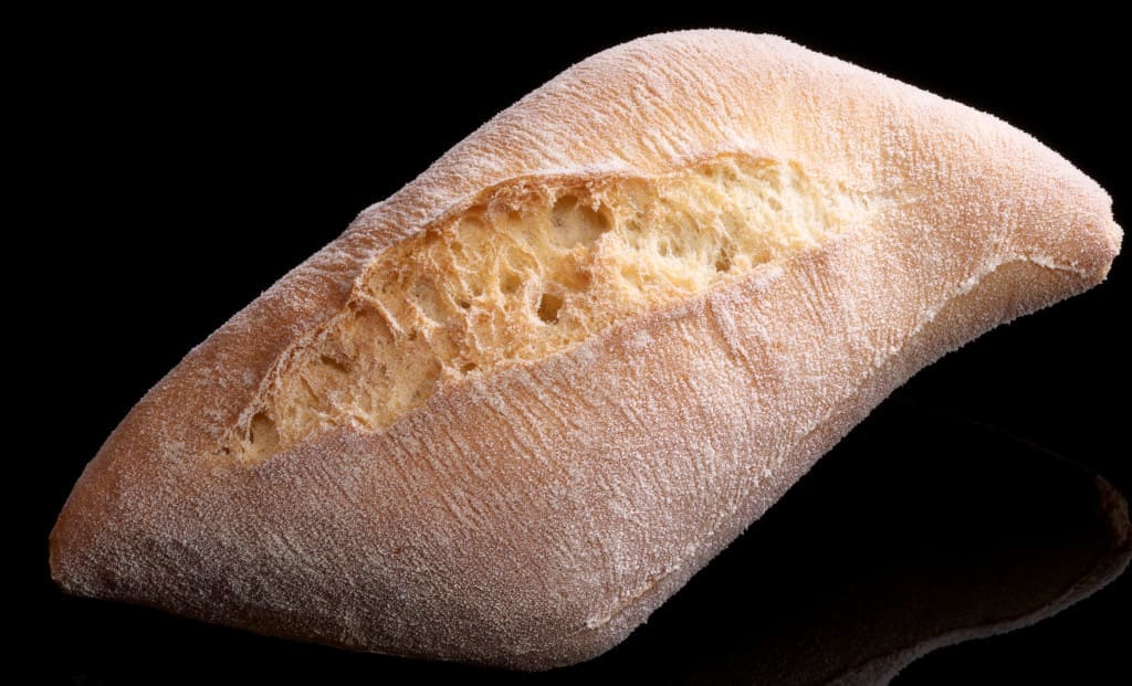 frozen german bread roll in black reflective back