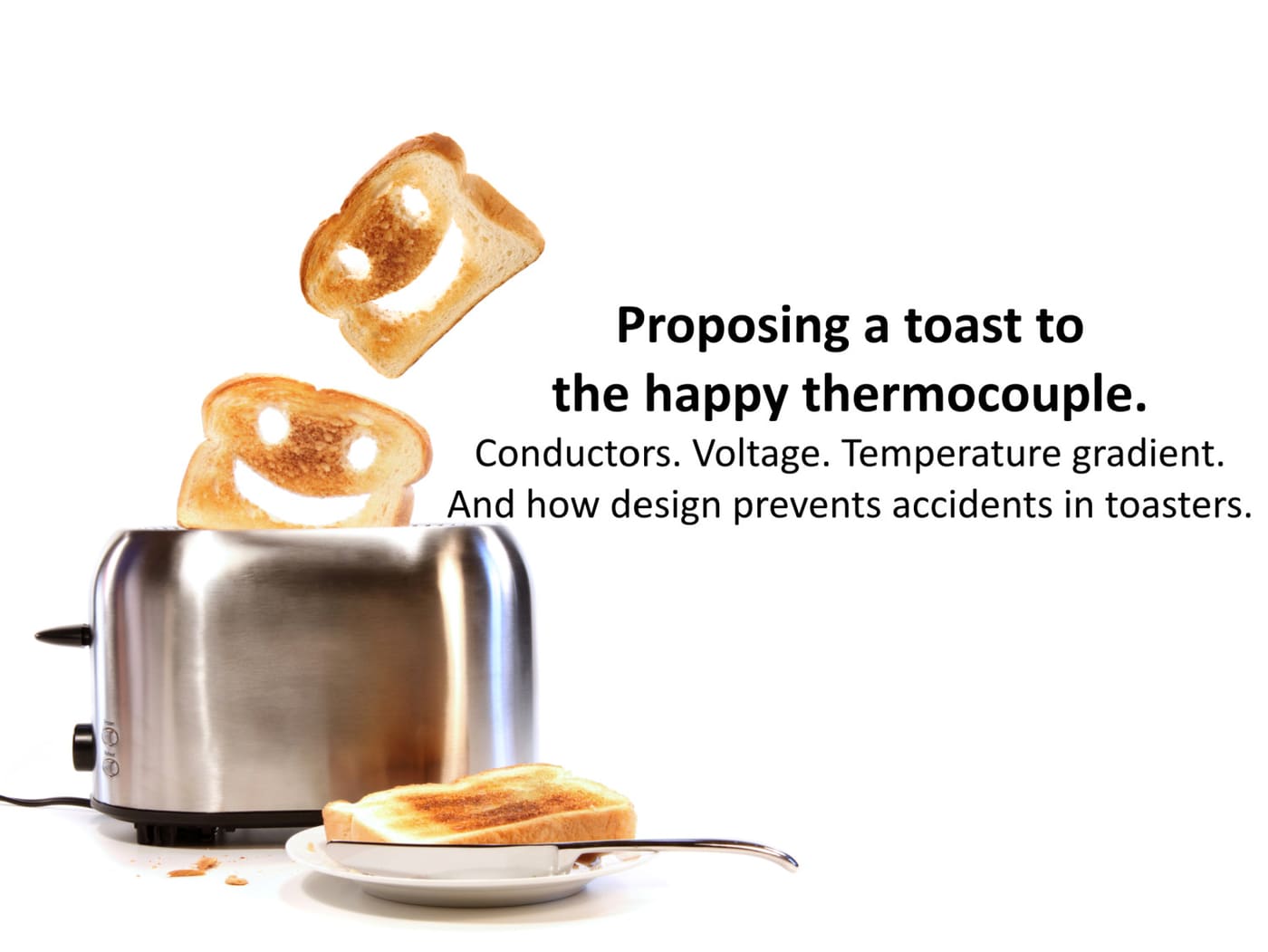 Two pieces of toast popping out of an old fashioned toaster