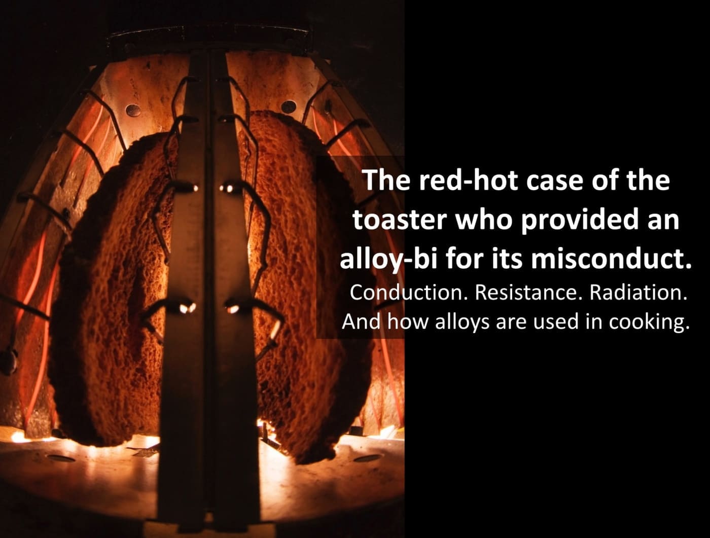 Looking inside the toaster at the red hot heating filament