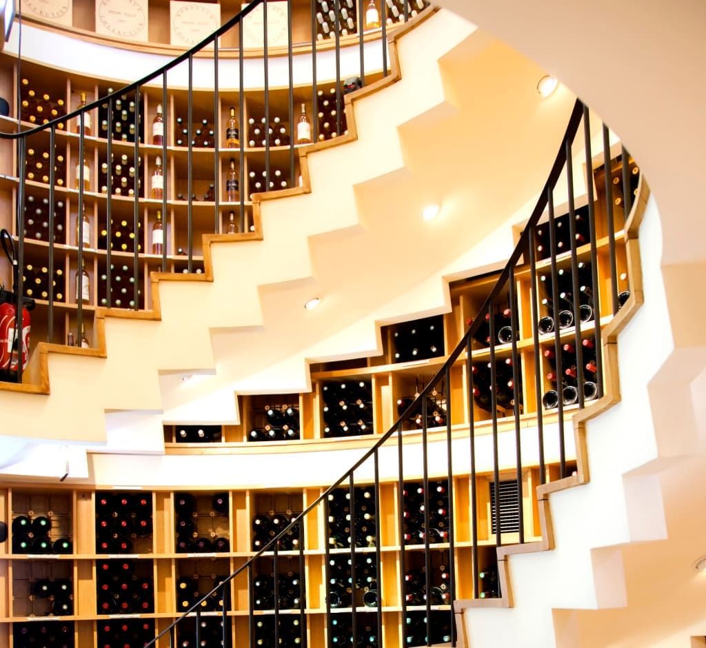 stairs and glass bottles in modern France wine shop