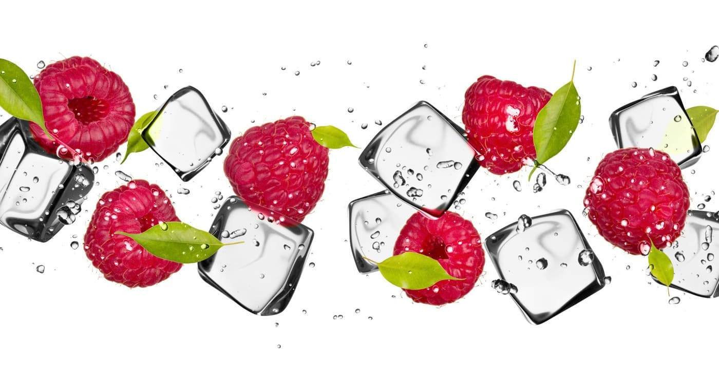 clear ice makes cool drinks - Raspberries with ice cubes, isolated on white background