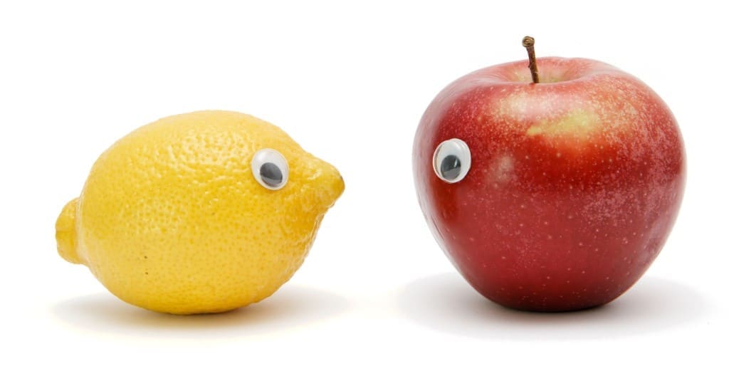 Funny lemon and apple with eyes isolated
