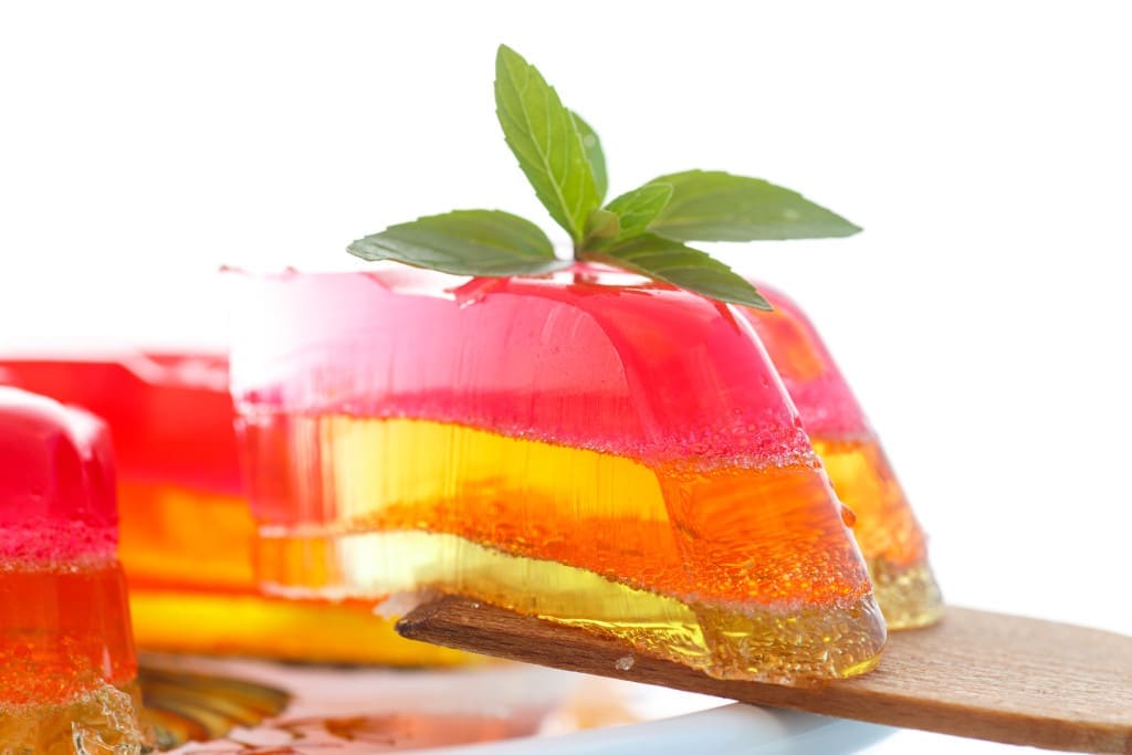 multi-layered fruit jelly isolated on white background
