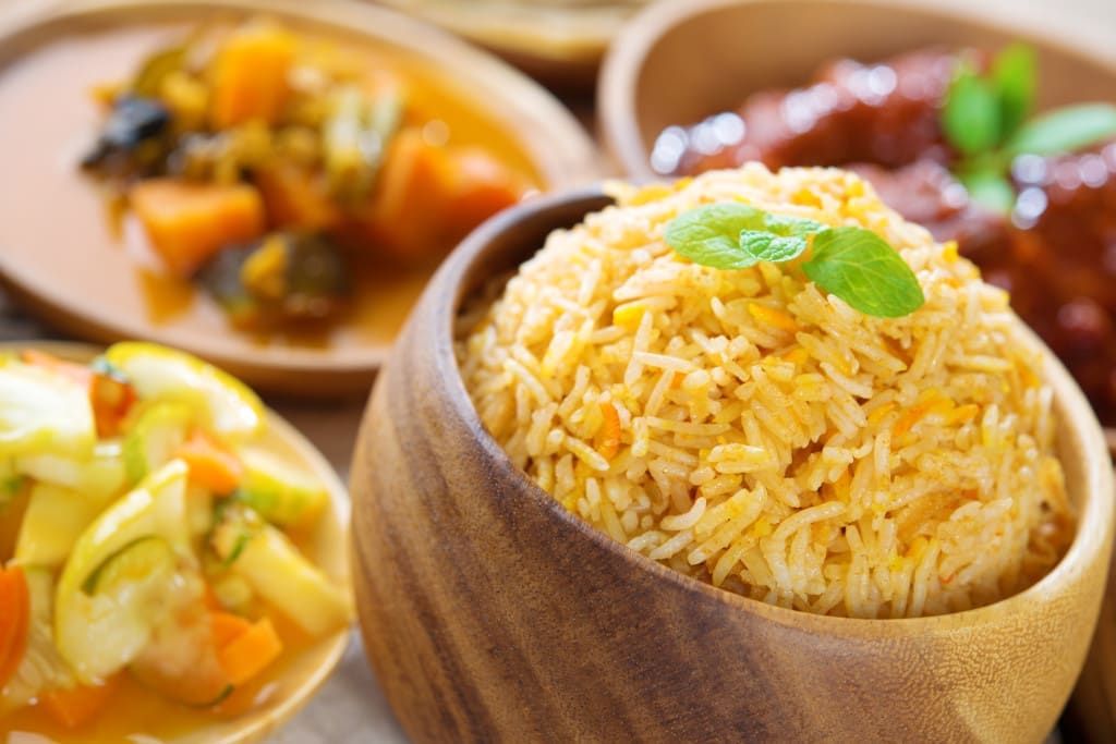 Long rice grains - Biryani rice or briyani rice, fresh cooked basmati rice, delicious indian cuisine.