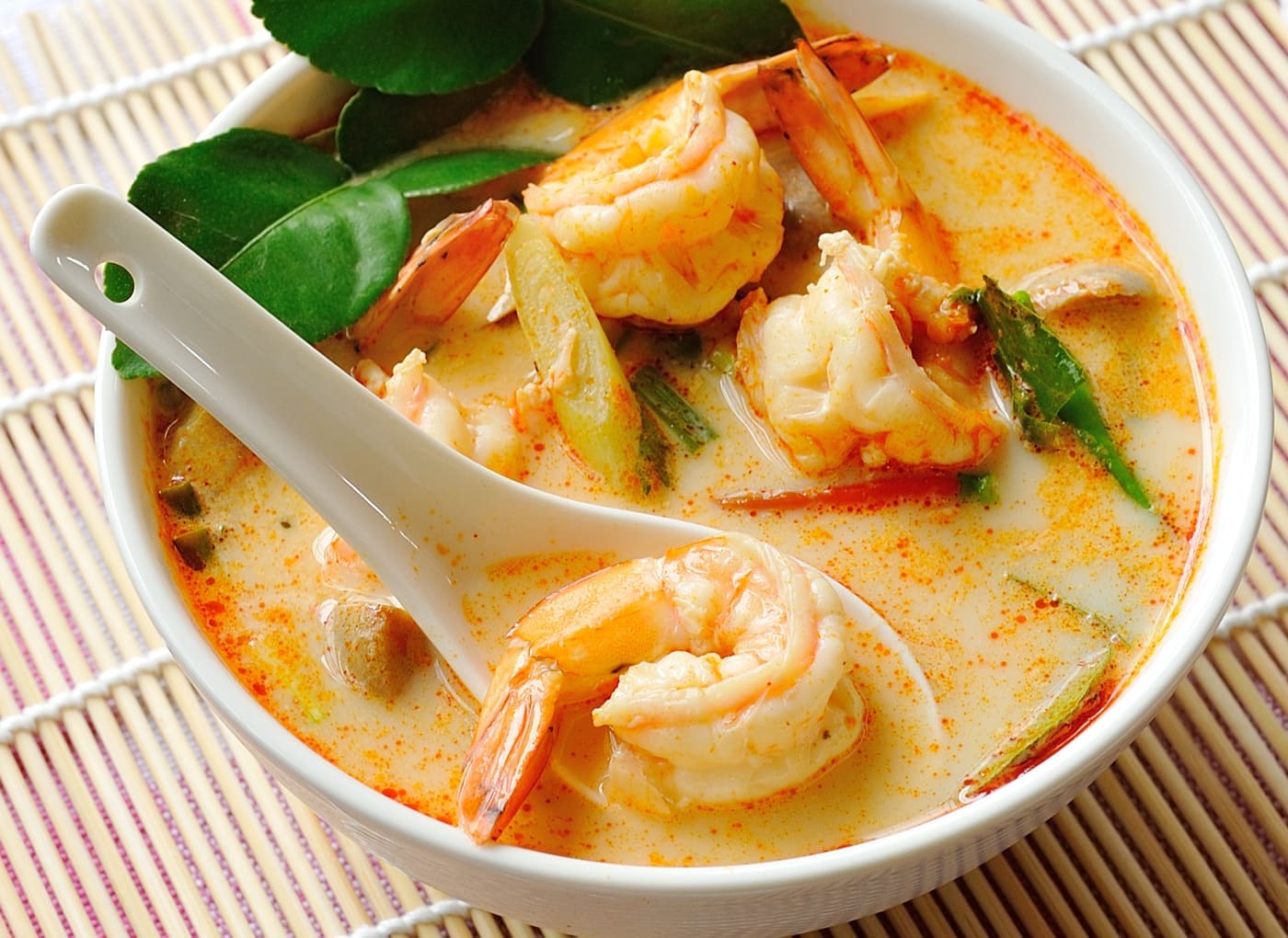 Spicy Tom Yam Kung soup (Thai cuisine)