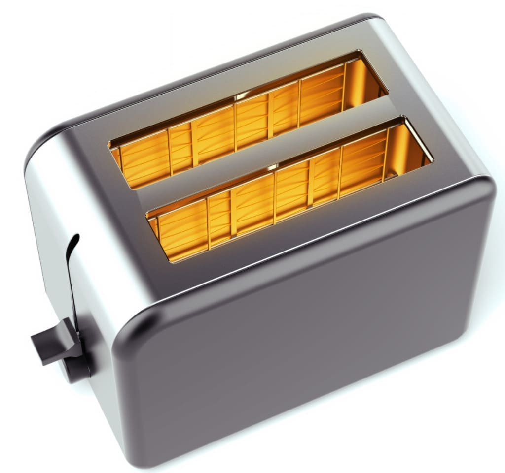 Chrome toaster isolated on a white background.