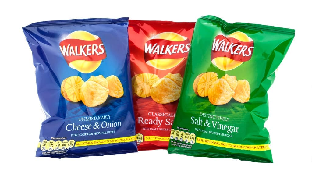 Opaque bags cuts down UV that can induce the free radical reactions that lead to oxidation and rancidity - SWINDON, UK - APRIL 13, 2014: Three packets of Walkers crisps isolated on a white background. Walkers is a British snack food manufacturer