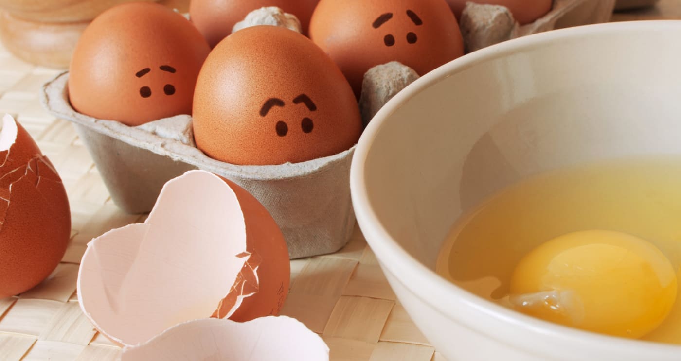 Frightened eggs in a paper carton wait, when from them will prepare an omelette