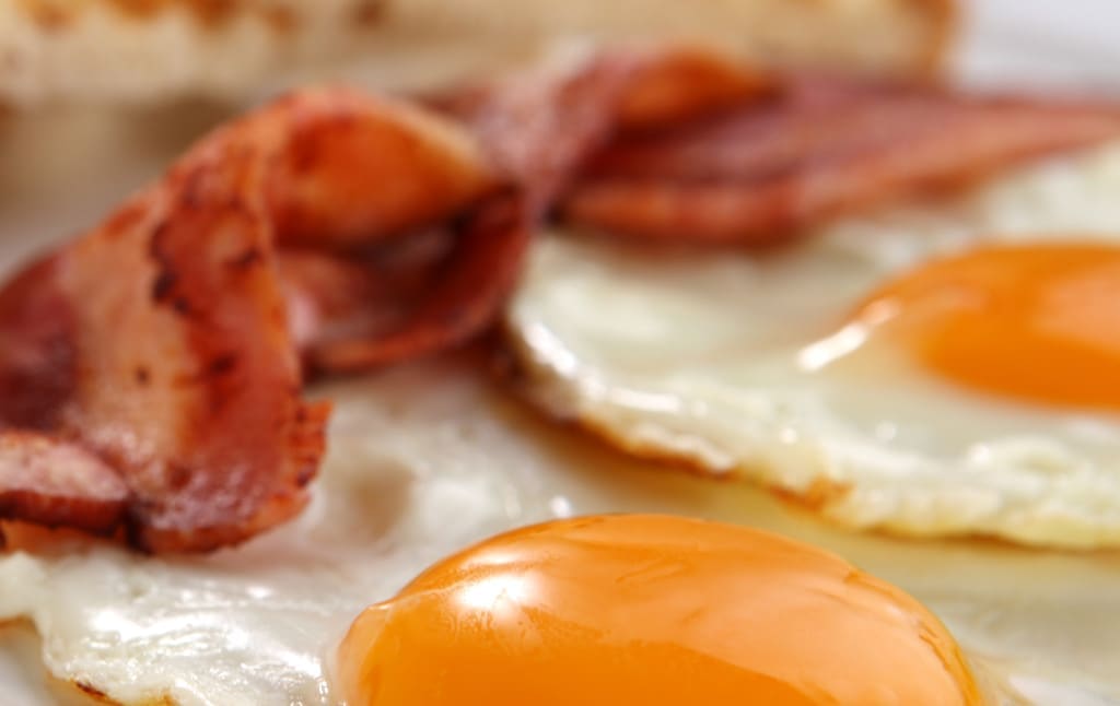 Breakfast - toasts, eggs, bacon