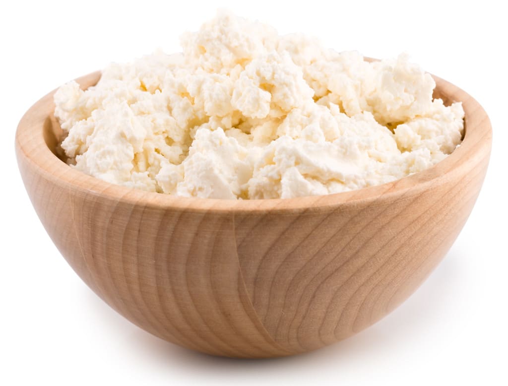 Cottage cheese. Curd isolated on white (with clipping path)
