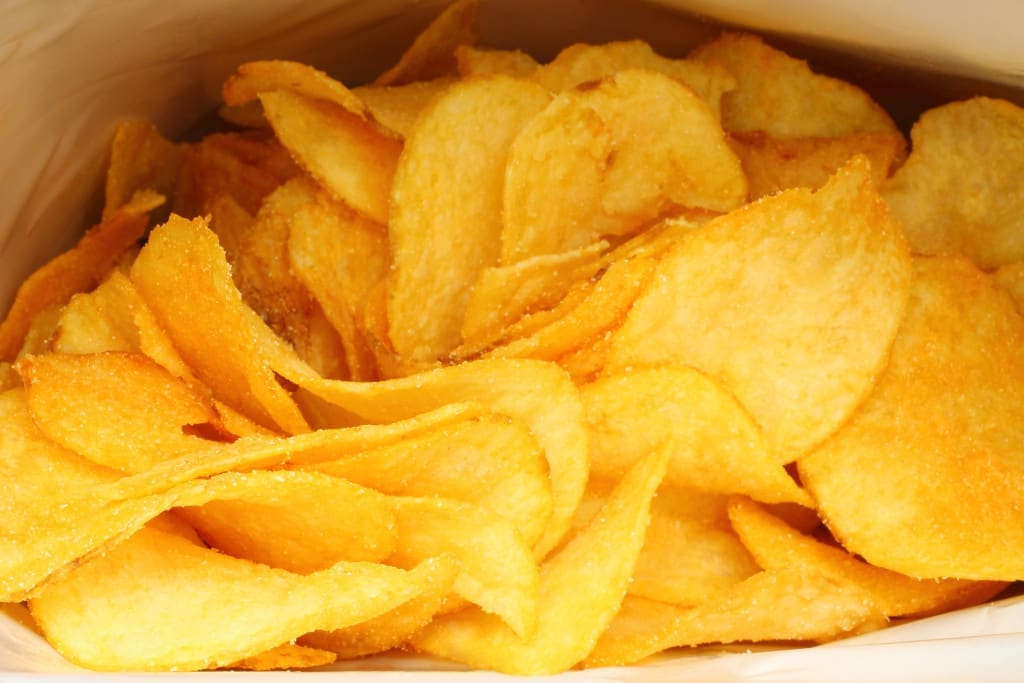 Filling the bags of potato chips with nitrogen reduces free radical reactions and in turn oxidation