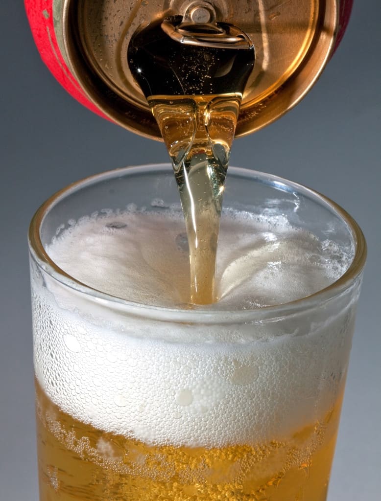 the head forms because of the carbon dioxide in the can of beer
