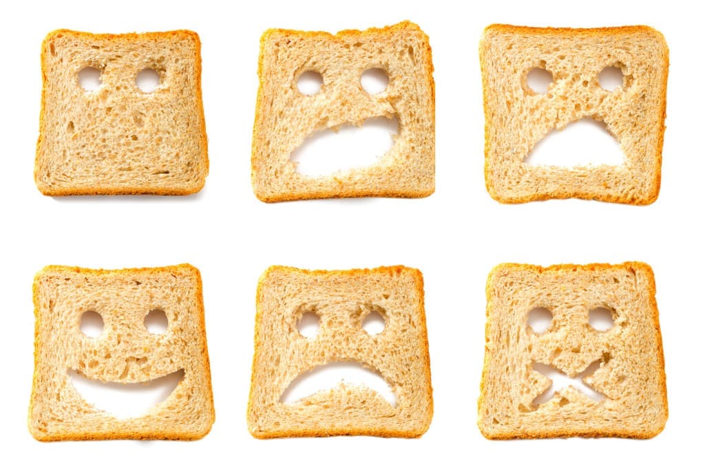 Toasted bread slices for breakfast with funny faces