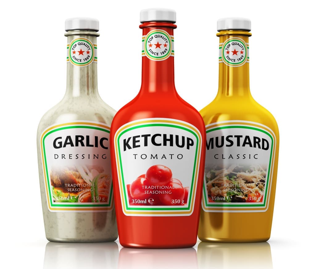tomato ketchup, garlic dressing, mustard - Set of plastic bottles with different seasonings - tomato ketchup, yellow mustard and garlic dressing isolated on white background with reflection effect
