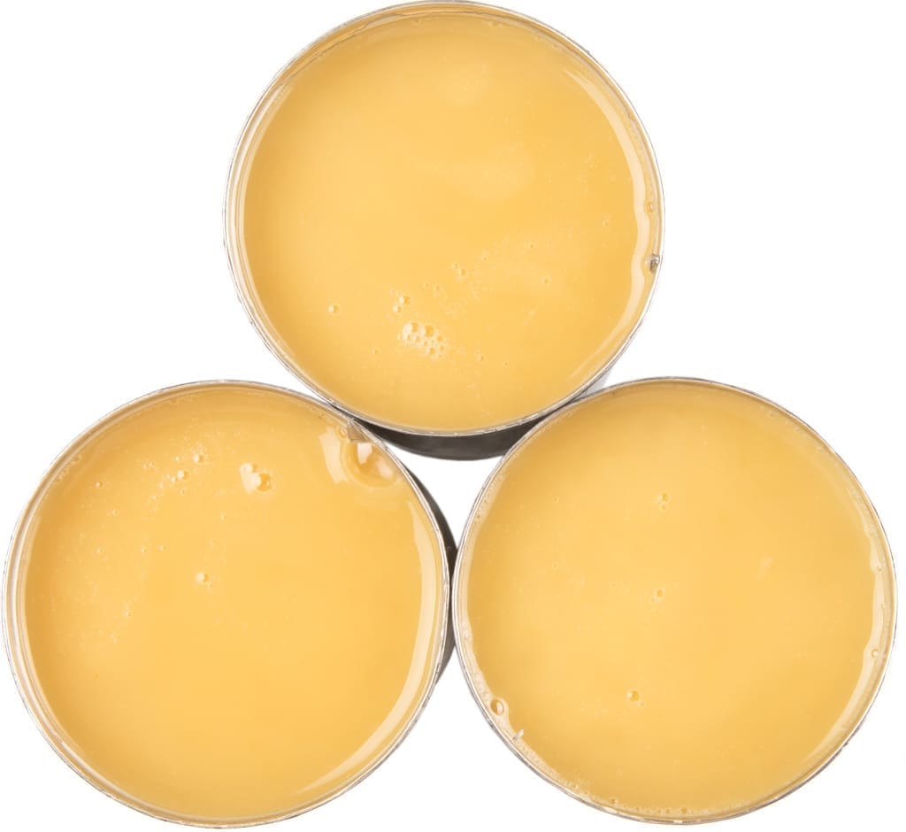 The higher concentration of sugar is what gives sweetened condensed milk its darker yellow shades